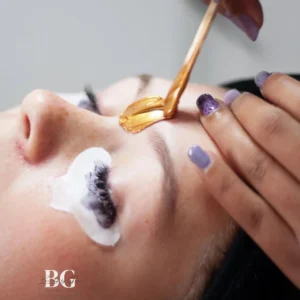 Orange face mask being applied